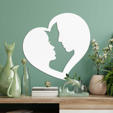 Ozdoba w kształcie serca, w której połączone są kontury dwóch twarzy. Ozdoba w kształcie serca, w której połączone są kontury dwóch twarzy.