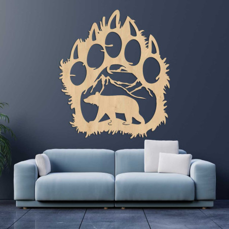 Drewniany malowidło ścienne łączące kształt śladu stopy niedźwiedzia z krajobrazem górskim. Drewniany malowidło ścienne łączące kształt śladu stopy niedźwiedzia z krajobrazem górskim.